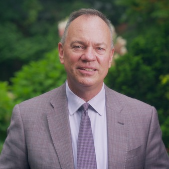ϳԹ President Marc C. Conner smiles and speaks. 